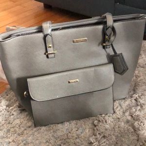 Brand new never used elim and Paul pocket book and matching smaller bag